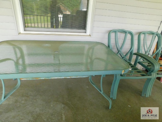 Glass top table and chairs