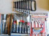 lot of wrenches, punches, chisels, and socket screwdrivers