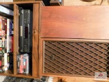tv stand with speakers and movies