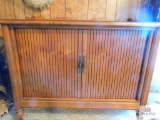 console with sliding doors