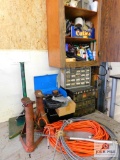 contents of shelf and table- nuts, bolts, cleaning supplies, jack stands, etc..