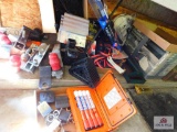 large lot under table: truck hitches, windshield wipers, saw blades, nails, etc..