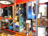 shelf and contents: battery charger, oils, electric cords, blades, etc.