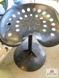 antique metal wagon seat on base