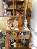 contents of cabinets: cleaning products, hose nozzles, blank plaques, craftsman mesh and wool