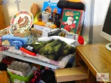 rolling stand with HP monitor and monitor brackets, assorted shirts and hats, blankets, airbed,