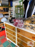 table with 2 chairs, chest of drawers, 2 children's chairs, woven blankets, trial boss hat