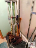 men's dress shoes, crutches, canes