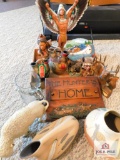 collection of Indian statues and pottery