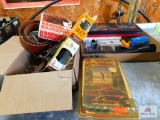 range finder, big game hoist, powder measure, tree steps