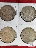 Peace Silver Dollars: 3 are 1923, 1 is 1924