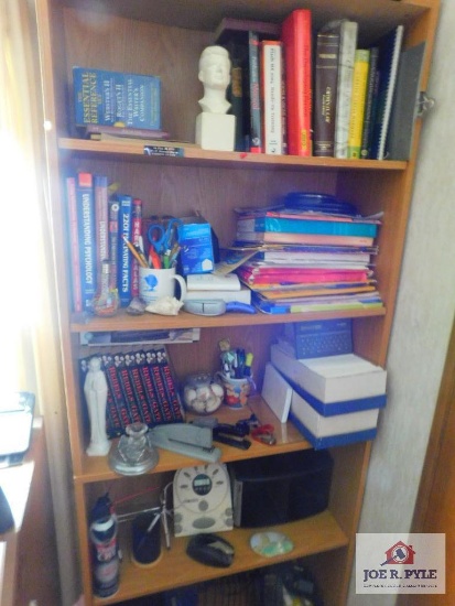 Bookshelf and contents: books decorative items, organizers
