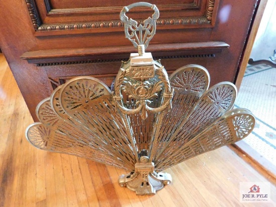 Folding brass fan fireplace screen