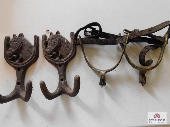 Spurs, cast iron hooks