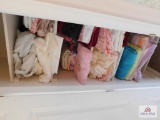 Contents of closet: towels and bed linens
