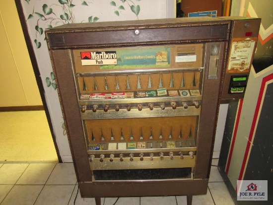 cigarette vending machine w dollar bill changer on side no keys