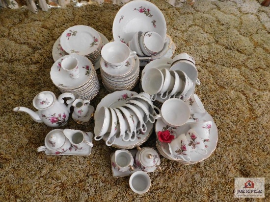 Collection of rose pattern china , tea sets, cups saucers, and bowls
