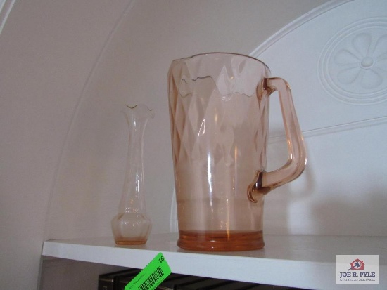 pink depression glass pitcher and vase