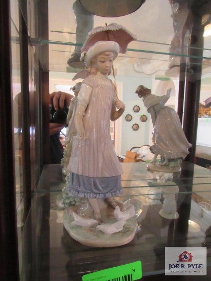 lladro lady feeding doves