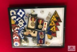 Display of military patches, medals, buttons, pins, and more