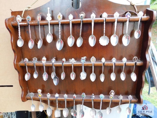 Large collection of state spoons and rack