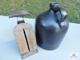 Brown jug and scale