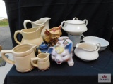Pottery items, pitchers, sugar, creamer, and planters