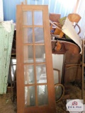 approx. 6.6 ft. glass paneled door approx. 30' wide