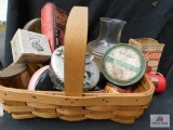 Basket containing tin containers, bob-a-loop game