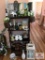 Shelf and contents: decorator, mirror, clock, basket, bunnies, etc.