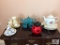 Lot Tea pots on top of side table (not table)