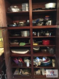 Contents of kitchen cupboard: pots and pans, baking, utensils, etc.
