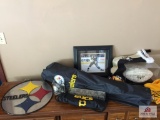 Lot top of dresser: Steeler, Pirates and Penguin items