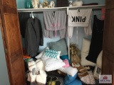 Contents of closet: clothing, new blankets, decorator, etc.