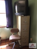 Filing cabinet, Office chair, TV