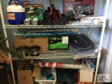 Lot three bottom shelves: Camping and grilling gear, Anchor cookware, etc.