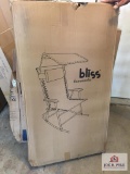 New in box Bliss lawn rocking chair and Rimax plastic rocking chair