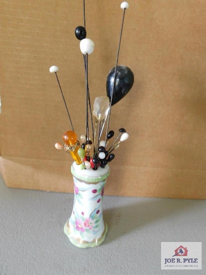 Collection Of Hairpins And Floral Holder