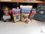 Wire Shelf With Glasses And Collection Of Tins