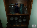 Bookshelf And Collection Of Jars