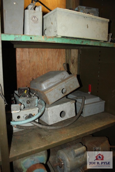 All contents of shelf section, Breaker Boxes, Antique electric motors, desk lamp