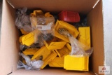Box of nut and bolt holders, various metal and plastic threaded plugs