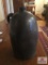 Stoneware jug has crack