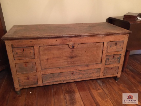 Very early seven drawer blanket chest retains some original paint has key