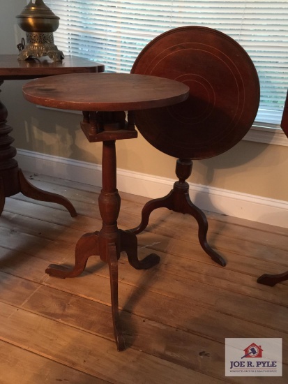 Two flip top side tables