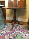 Antique paw foot tilt top table