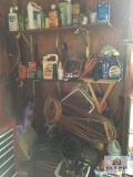 Large lot on wall: garage items, electric cords, tools, mini compressor, etc.