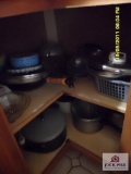 contents in right corner cabinet and left corner cabinet baking pans, cookie sheets, cutting boards,