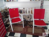 2 red and white chairs