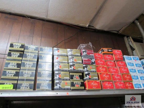 approx. 55 empty cigarette tubs